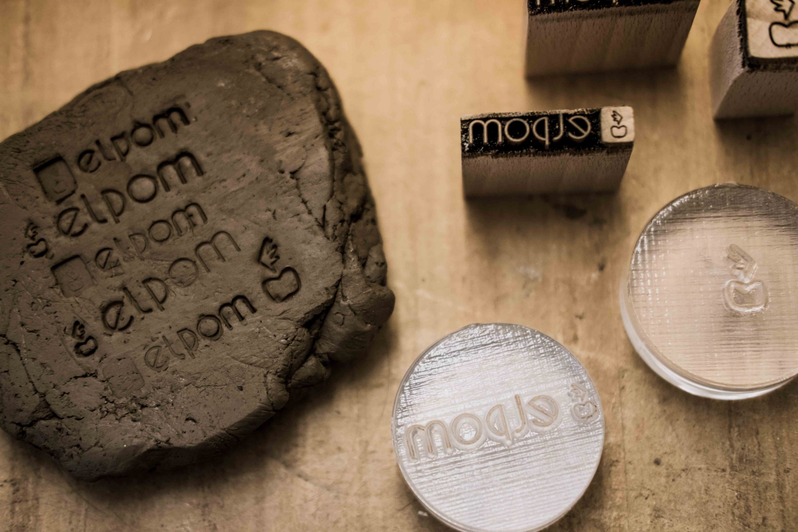 elpom logo stamps tests