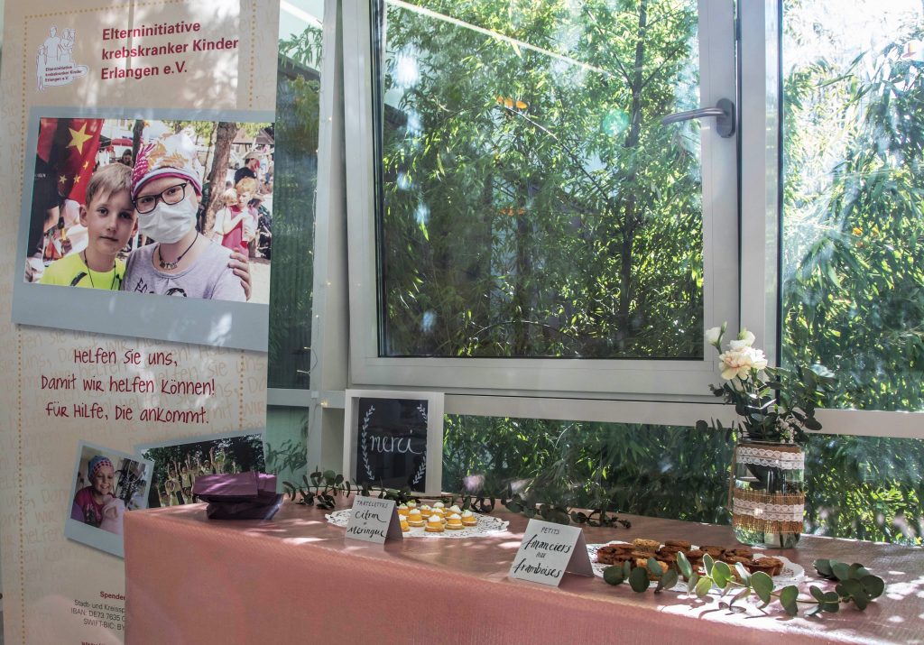 elpom photo exhibition vernissage kinderklinik donation